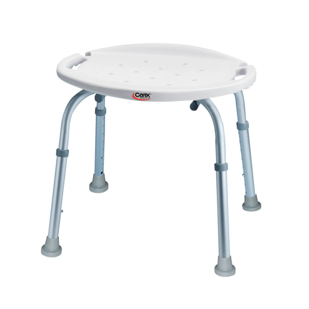 The Carex Bath Chair and Shower Chair features a round, white plastic seat with drainage holes, adjustable aluminum legs, and rubber tips for stability—ideal for elderly users seeking comfort and safety in the bath or shower.